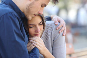 Husband consoling wife who is need of anxiety disorder treatment