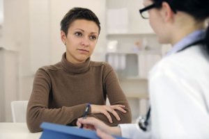 A woman talks to a doctor as a part of her behavior health treatment in bellaire tx
