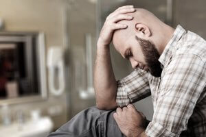 a stressed man is in need of Houston social phobia therapy from a Houston social phobia psychiatrist