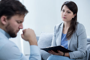 a man talks to a Houston personality disorder therapy psychiatrist
